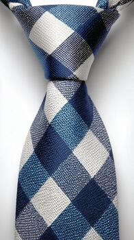 Elegant Blue and White Checkered Tie Showcasing Its Intricate Pattern and Classic Style photo