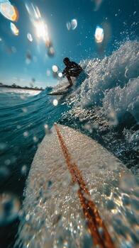 Surfer Enjoying Thrilling Waves Under a Sunny Sky at the Beach. photo