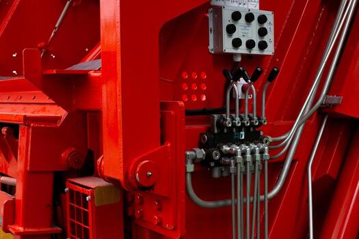 Moscow, Russia, August 6, 2025. Control panel with levers and buttons on the back of the garbage truck. Control of garbage bin for loading into body of the garbage compactor photo