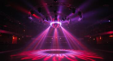 Vibrant Disco Ball Showers an Empty Dance Floor in Red and Purple Light photo