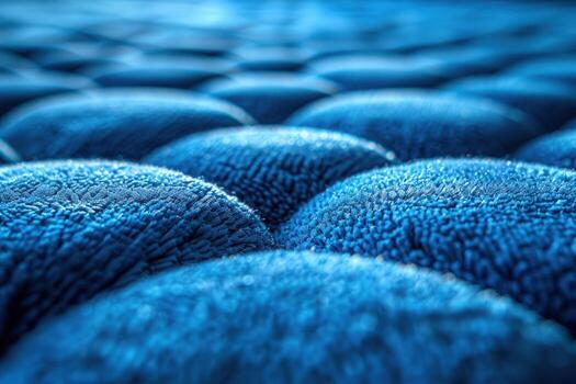 Abstract blue textured surface with repeating patterns. photo