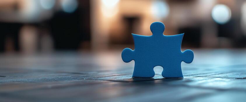 A Single Blue Puzzle Piece on a Dark Surface, Symbolizing Connection, Solution, or Missing Part photo