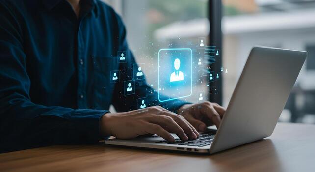 Man using laptop for hr management and recruitment process with networking and social media concept photo