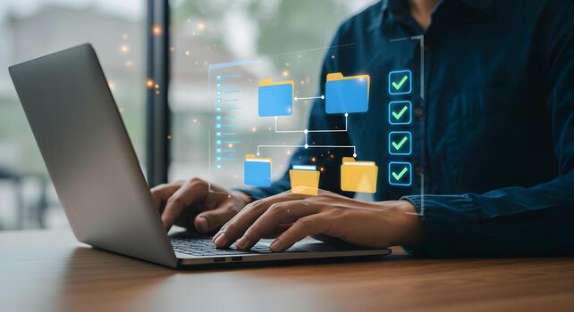 File management system for business document workflow automation and data organization on laptop computer photo