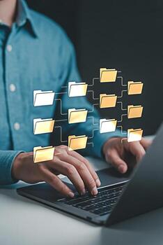 Data management system using laptop for file sharing and folder structure organization and cloud storage backup photo