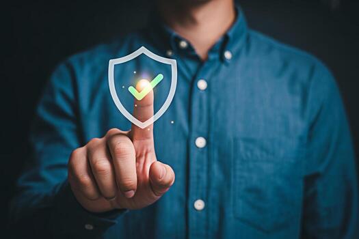 Security and protection concept man touching shield icon for cybersecurity data privacy and internet network photo