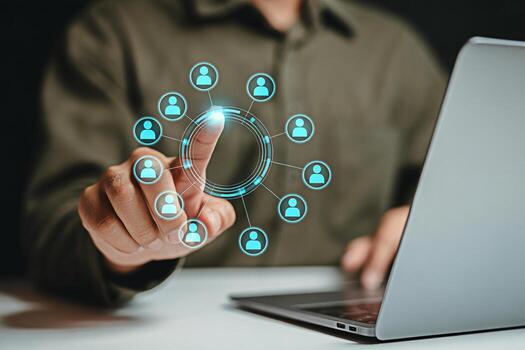 Man using laptop for social media networking and connection with digital interface technology photo