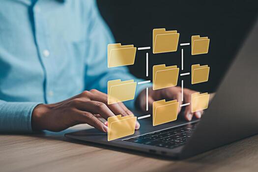 Data management and file sharing concept with folders on laptop for cloud storage and organization system photo