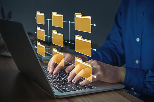 Data management and file organization on laptop for efficient workflow and document storage system online access photo