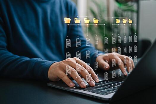 Data management system concept person using laptop for organizing digital files and folders 100 photo