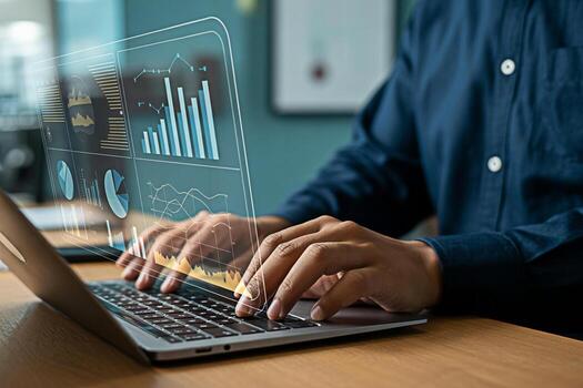 Analyzing business data on laptop with financial charts and graphs for strategic decision making process photo