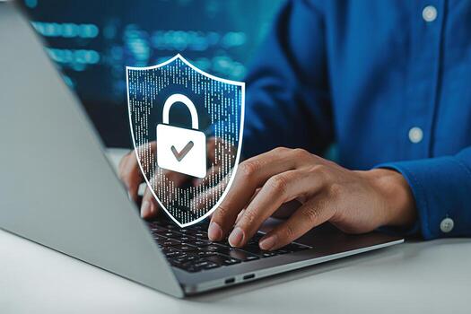 Cyber security concept of data protection and secure internet access on laptop keyboard typing hands photo