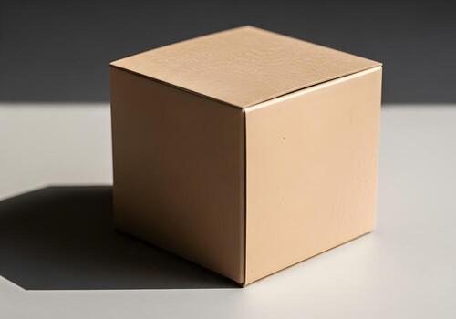 Minimalist tan box with shadow creating a geometric pattern on surface photo