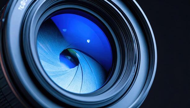 Close up of camera lens with blue reflections and intricate glass details, highlighting precision and technology, evoking sense of focus and clarity in photography or videography photo