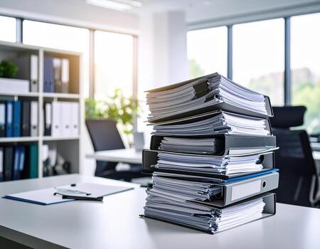 Stacks of paperwork modern office setting create sense of busyness and organization. sunlight streaming through windows adds warmth to workspace, highlighting importance of efficient document photo