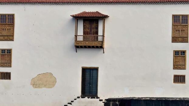Historic architecture featuring a charming balcony with a picturesque doorway view photo