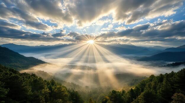 Majestic sunburst rays illuminate misty valley surrounded by mountains and trees photo