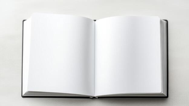 Blank notebook open on white surface, inviting creativity and ideas photo