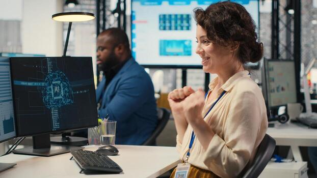 Cheerful businesswoman being proud of good infographics with AI tools, using artificial intelligence for optimization and goals achievement in a multinational company. Neural networks. Camera B. photo