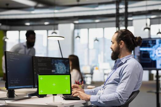 Engineer using isolated screen tablet to adjust machine learning algorithms parameters, automating workflow. Tech company employee using AI insights for code optimization on chroma key device photo