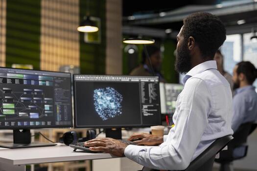 Software engineer leverages AI language model assistance while coding in artificial intelligence company office. Startup programmer integrates LLM chatbot suggestions into code editor photo