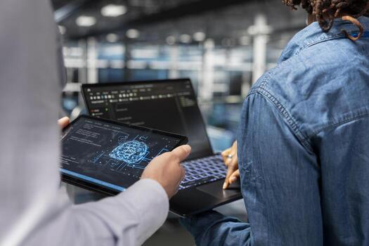 Close up of administrators performing maintenance on supercomputers with AI tools systems. Server farm workers upgrading datasets used for deep learning, neural network analytics. photo