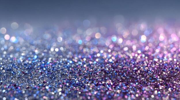 A close up of glitter on a blue background photo