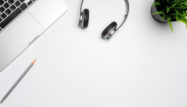 Office table desk with personal computer, headphone, and pencil flat lay on white background showcasing essential workspace items, perfect for office branding, productivity themes, technology projects photo