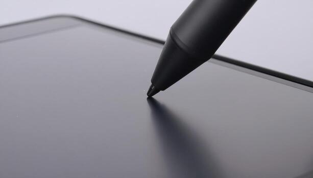 Macro close up of a stylus tip hovering over a tablet screen with copy space on the side, suitable for technology themes, digital art projects, design visuals, modern device concepts, and creative photo