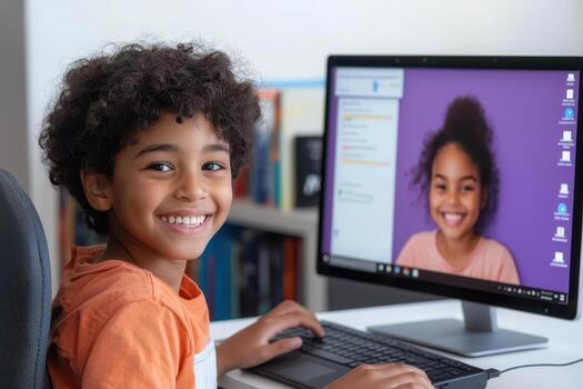 Child smiling while attending virtual computer photo