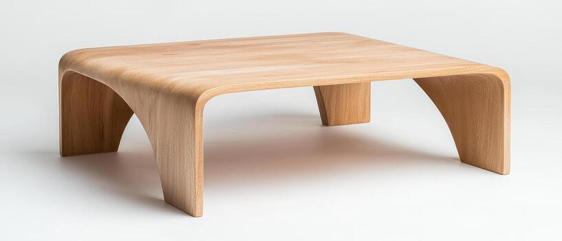 Rectangular beech wood coffee table with beveled edges and smooth curved legs photo