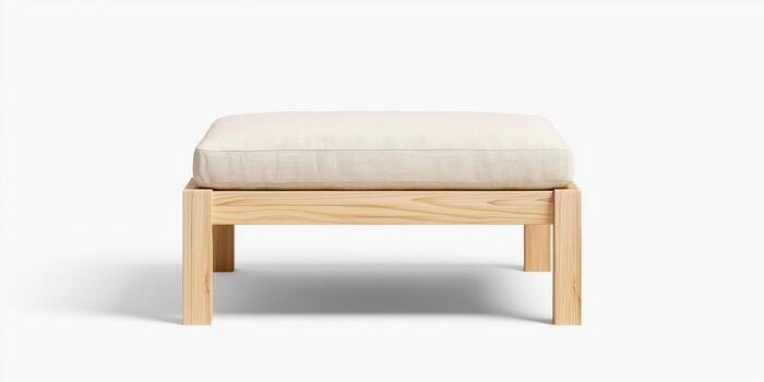 Wooden ottoman with beige cushioned top and simple modern design photo