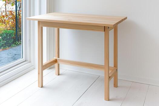 Compact pine wood workstation with foldable top in bright room near window photo