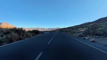 A road in the mountains with mountains in the background video