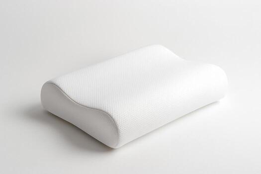 Orthopedic contour memory foam pillow on a clean white background with soft shadow. Minimal product shot with copy space. photo