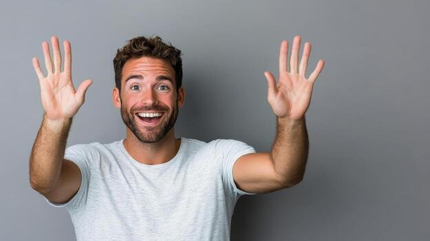 Happy man with raised hands expressing excitement and joy photo
