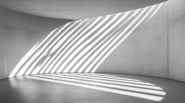 Curved concrete wall with minimal shadows creating abstract pattern of light and space photo