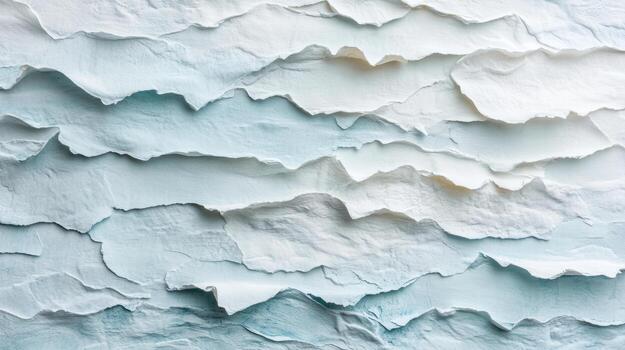 Textured layers of soft blue and white paper create calming, abstract background photo