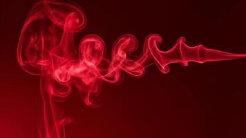 astratto rosso Fumo sentieri. un' dinamico Schermo di artistico movimento e vorticoso le forme video