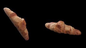 ciclico rotazione di Due tipi di Cornetti in giro loro asse. ciclo continuo movimento. avvicinamento. alfa canale. video