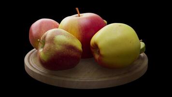 Looping animation around a composition of apples lying on a wooden board. Loop motion. Close-up. Alpha Channel. video