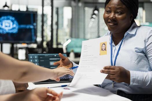 Professional hiring staff integrates neural networks tools into the recruitment process, using machine learning to assist in selecting candidates based on profile data and interview feedback. photo