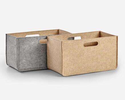 Two empty felt storage boxes with handles for organizing clutter photo
