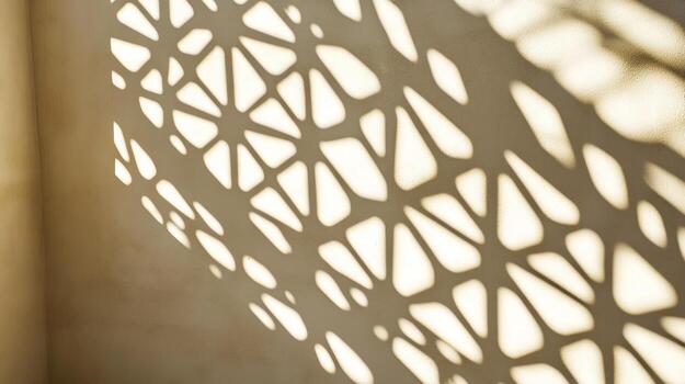 Abstract shadow pattern on a light beige wall photo