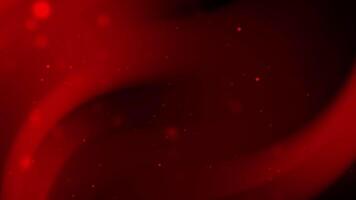 Red swirly background with small red lights glowing, suitable for abstract designs, festive themes, or dramatic visual projects. video