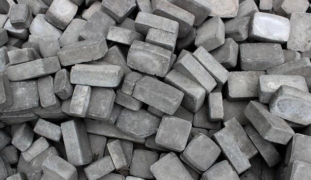 Randomly scattered pavement slabs made of concrete textured photo for backgrounds