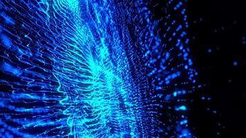 exploderend Golf van lichtgevend blauw deeltjes in beweging tegen een donker achtergrond video