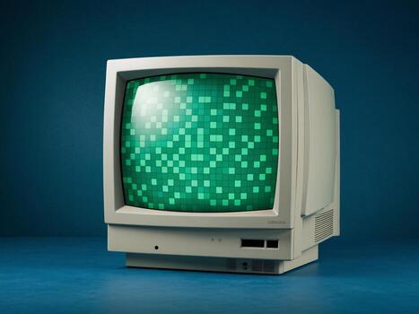 An old-style computer monitor displaying a green pixelated pattern against a solid blue background. photo