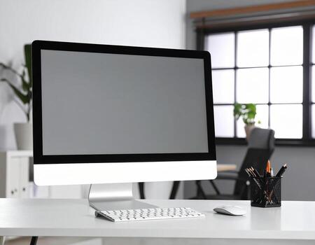 Modern computer on stylish office desk with clean design, creating productive workspace atmosphere photo