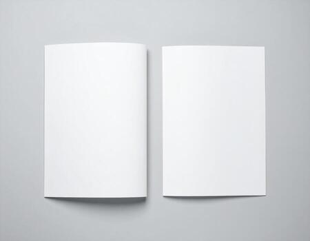 Blank brochures on grey background, top view, mockup for design, high fidelity, open and closed photo